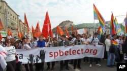 A girl, who returned from school, cries upon seeing her house destroyed after a jet missile hit the al-Myassar neighborhood of Aleppo, Syria. 