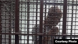 泰国囚车里的中国政治流亡者杨崇