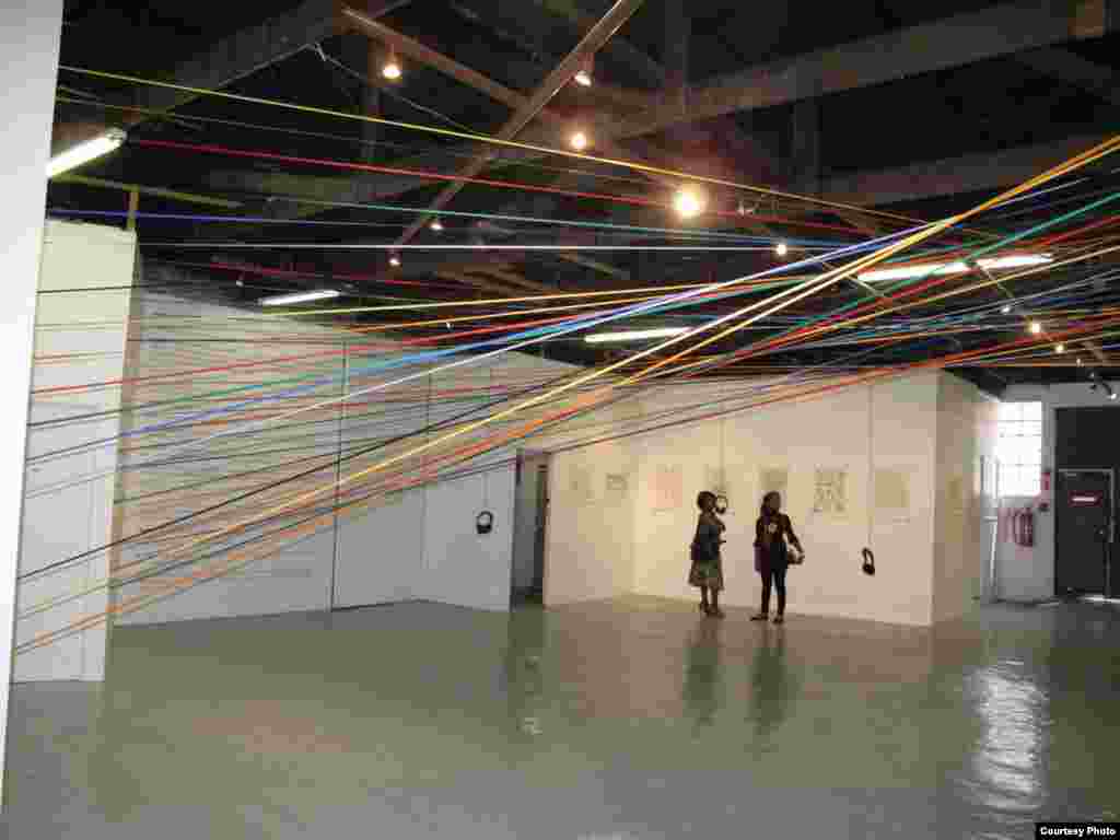 People wander through a Lace exhibition at a gallery in Johannesburg (Photo: B. Lace)