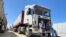 Trucks carrying humanitarian aid line up on the Egyptian side of the Rafah border crossing with the Gaza Strip on March 2, 2025, after Israel suspended the entry of supplies into the Palestinian enclave.