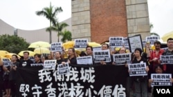 An Orthodox priest conducts a burial ceremony of 228 Soviet soldiers killed during World War II, in a memorial cemetery at Nevsky Pyatachok near Kirovsk, Russia.
