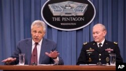 美國國防部長哈格爾(圖左)與參謀長聯席會議主席登普西上將(圖右)