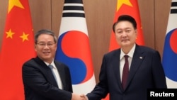 南韓總統尹錫悅5月26日下午在首爾會見前往南韓出席中日韓領導人峰會的中國國務院總理李強.