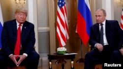 Дональд Трамп во время официальной президентской встречи с Владимиром Путиным в Хельсинки. 16 июля 2018 года.