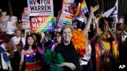 Democratic presidential candidate Sen. Elizabeth Warren, D-Mass., marches in the Las Vegas Pride Parade, Oct. 11, 2019, in Las Vegas.