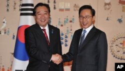 南韓總統李明博(右)星期三與日本首相野田佳彥(左)在首爾會談。