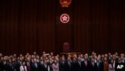 香港立法會議員和特首李家超在通過《維護國家安全條例草案》後合照。