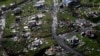 FILE - Destroyed communities are seen in the aftermath of Hurricane Maria in Toa Alta, Puerto Rico, Sept. 28, 2017. 