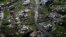 FILE - Destroyed communities are seen in the aftermath of Hurricane Maria in Toa Alta, Puerto Rico, Sept. 28, 2017. 