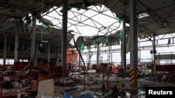 烏克蘭哈爾科夫郊外的一家郵政配送中心2023年10月22日遭到俄羅斯飛彈攻擊。