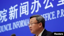 中國商務部副部長王受文在北京召開的記者會上宣布美中已就第一階段貿易協議文本達成一致。 （2019年12月13日）