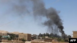 阿富汗政府軍和塔利班反叛武裝在西部城市瑙堡交戰。 (2021年7月7日)