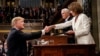 President Donald Trump before delivering the State of the Union address, with Vice President Mike Pence and Speaker of the House Nancy Pelosi, at the Capitol in Washington, Feb. 5, 2019.