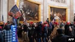 1月6日特朗普總統的支持者衝進國會大廈抗議。（照片來自AFP）