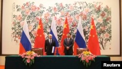 2014年11月9日中國國家主席習近平與俄羅斯總統普京於北京釣魚台賓館。(資料照)