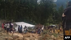巴布亚新几内亚发生大规模山体滑坡可能已导致超过2000人被活埋。(AFP/Steve Kandai 2024年5月27日）