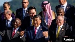 資料照：2024年11月18日，中國領導人習近平在巴西里約熱內盧舉行的G20峰會上與其他G20國家領導人合影。