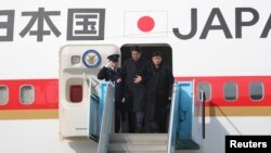 2018年2月9日，日本首相安倍晉三抵達南韓訪問（路透社）