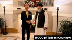 عکس آرشیف از دیدار وزیر تجارت و صنعت طالبان با وزیر خارجۀ هند