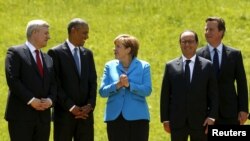 德國總理默克爾(中)出席七國集團首腦會議