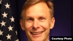 美國駐華代理大使阮大為。