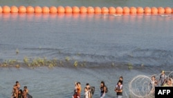 2023年7月16日，德州伊格爾帕斯的美墨邊境的移民。