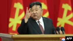 This undated photo released from North Korea's official Korean Central News Agency (KCNA) via KNS on July 2, 2024 shows North Korean leader Kim Jong Un attending the Enlarged Meeting of the 10th Plenary Meeting of the 8th Central Committee of the Workers'