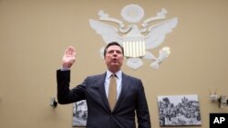 美国联邦调查局局长詹姆斯·科米星期四就克林顿电邮调查到国会作证